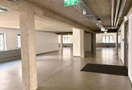 Urbanes Arbeiten im Industrial-Chic: Exklusives Büro mit Open-Space-Flair und Innenhof-Balkon