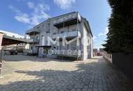 Miethaus mit 9 Wohnungen, Gemeinschaftsgarten und Carports