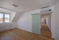 Dachgeschoßwohnung mit eingeschnittener Terrasse, vier Schlafzimmern und schönem Fernblick