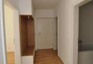 Moderne, sonnige Erdgeschoßwohnung mit Eigengarten und Tiefgarage