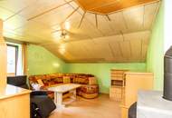 Viel Platz zum Leben – Zweifamilienhaus mit Werkstatt, Party-/ Hobbyraum & zwei Garagen in ruhiger Lage bei St. Wolfgang