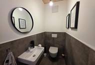 Modernes Plus-Energie-Reihenhaus in Massivholzbauweise