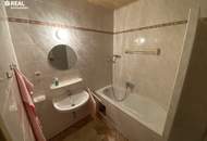 2 Zimmer und ca. 8 m² Terrasse