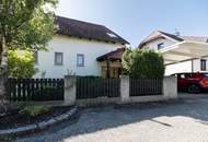 "Familienfreundliches Einfamilienhaus mit Wellnessbad, Sauna, Kachelofen, Fußbodenheizung, großem Garten und Doppelgarage in Tulln"
