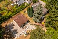 Zwei Häuser. Ein Rückzugsort. Ihre grüne Oase vor den Toren Wiens.