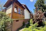SCHNUCKELIGES EINFAMILIENHAUS IN GRÜNER OASE MIT KELLER