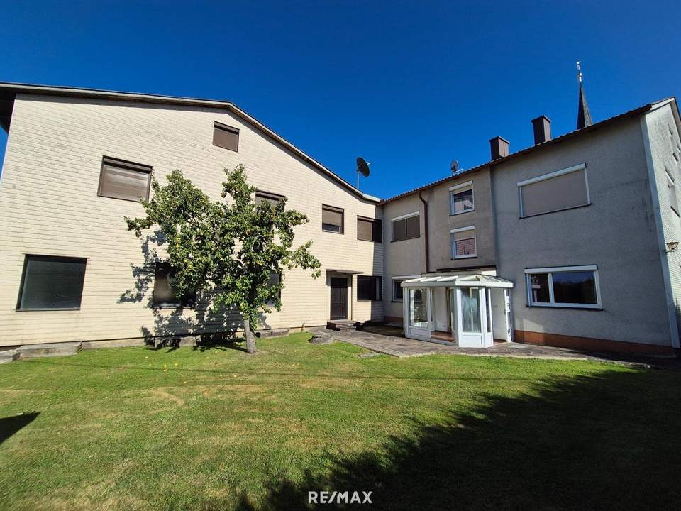 Mehrfamilienhaus mit Geschäftslokal