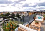 Neuwertige 2-Zimmer-Wohnung mit 19m² Dachterrasse und Fernblick