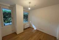 Moderne 4-Zimmer-Gartenwohnung mit Terrasse und Garagenplatz