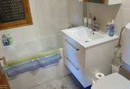 Urbanes Wohnen mit großem Garten mit kleinem Einfamilienhaus in Essling