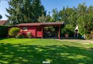 Großzügiges Haus mit sonnigem Garten, Carport, Garage und Fußbodenheizung!