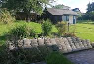 Sanierungsbedürftiges Zweifamilienhaus mit Nebengebäuden in Traumlage