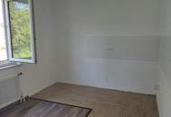 NEUER PREIS: Renovierte Wohnung mit sonniger Terrasse!
