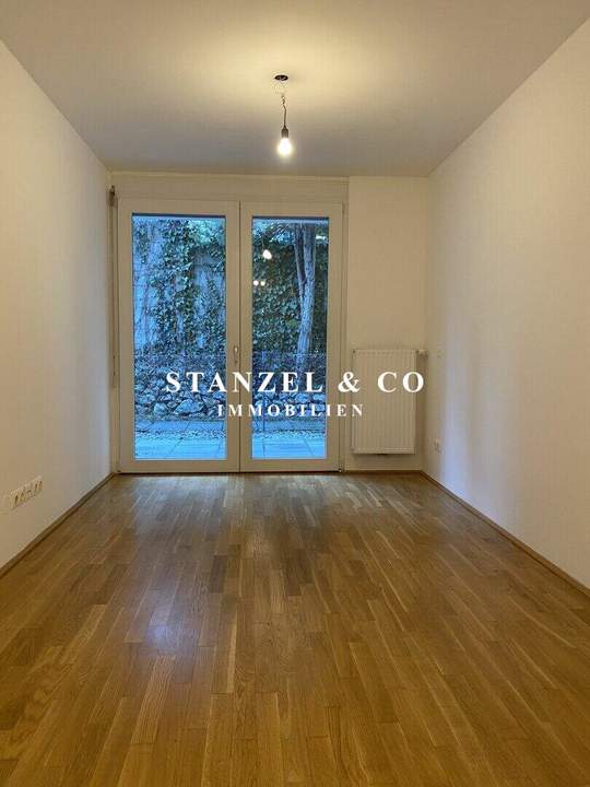 HELLES 2-ZIMMER-APARTMENT MIT GARTENTERRASSE ( BJ 2007 )