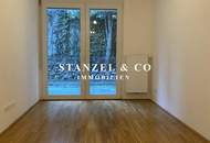 HELLES 2-ZIMMER-APARTMENT MIT GARTENTERRASSE ( BJ 2007 )