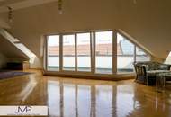 Großzügige DG Wohnung mit 2 ruhigen Südterrassen in zentraler Lage