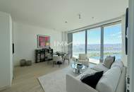 Waterfront Vibes im DC2 Tower – 2 Zimmer mit 15 m² Freifläche &amp; Kaiserwasser-Panorama