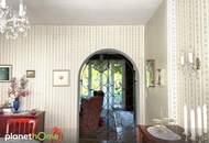 Charmantes Haus mit blühendem Garten in Top Lage