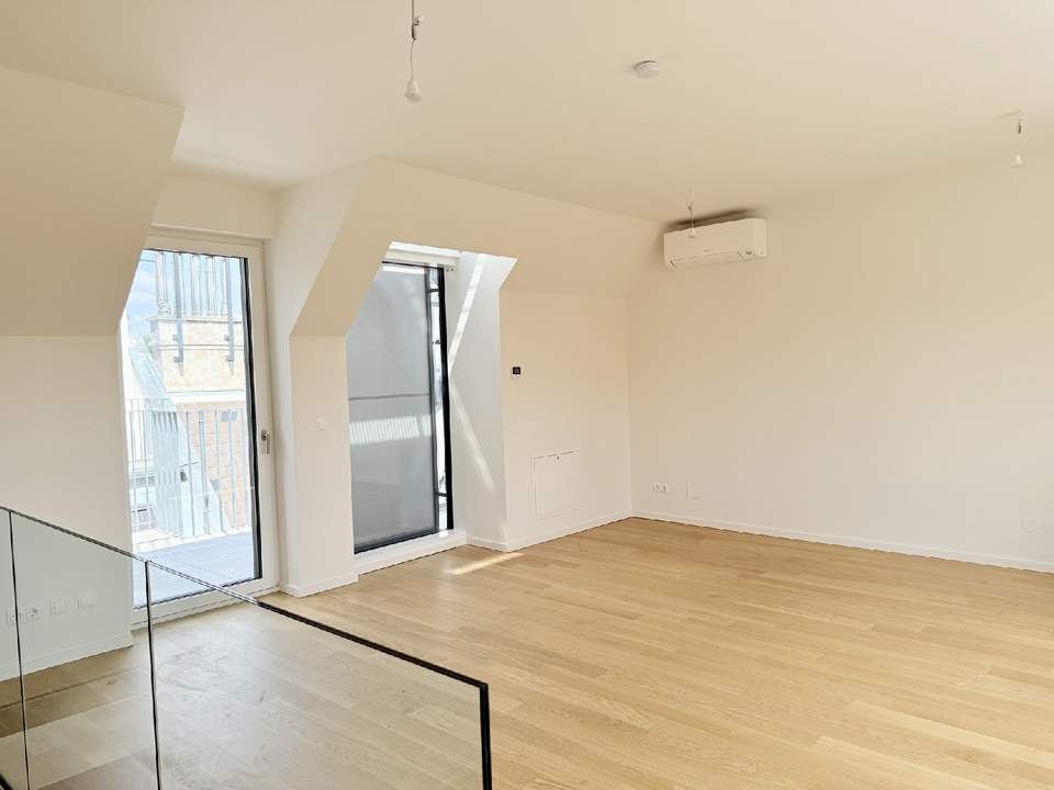 Eleganz trifft Lage – Neubau-Dachgeschosswohnung in Toplage