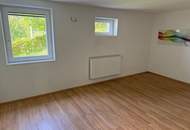 Ruheoase in Kleinstrohheim – Großzügige Erdgeschosswohnung mit Garten