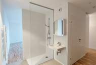 Sonnwendviertel: 1-Zimmer-Wohnung mit Balkon im 18. OG – Fitnessraum, Co-Working & Rooftop-Terrasse inklusive!