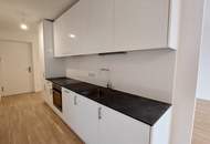 Sonnwendviertel: 1-Zimmer-Wohnung mit Balkon im 9. OG – Fitnessraum, Co-Working &amp; Rooftop-Terrasse inklusive!