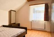 Einfamilienhaus mit Nebengebäude, Doppelgarage und großem Potenzial zur individuellen Gestaltung