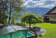 Mehr Raum. Mehr Ruhe. Mehr Ausblick - einzigartige Gartenwohnung mit Pool und Wellnessbereich