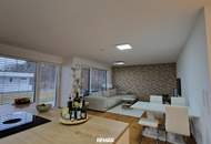 Exklusive 3-Zimmer-Gartenwohnung mit zwei PKW-Abstellplätzen
