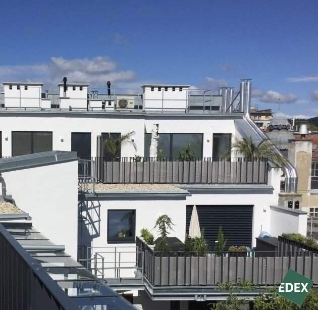 Dachgeschoss-Maisonettewohnung mit zwei Terrassen in ruhiger Innenhoflage