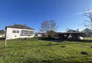 Haus in Grünruhelage mit offener Terrasse, Balkon und Garage