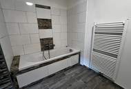 Vermietete 3-Zimmer-Anlegerwohnung mit großem Garten