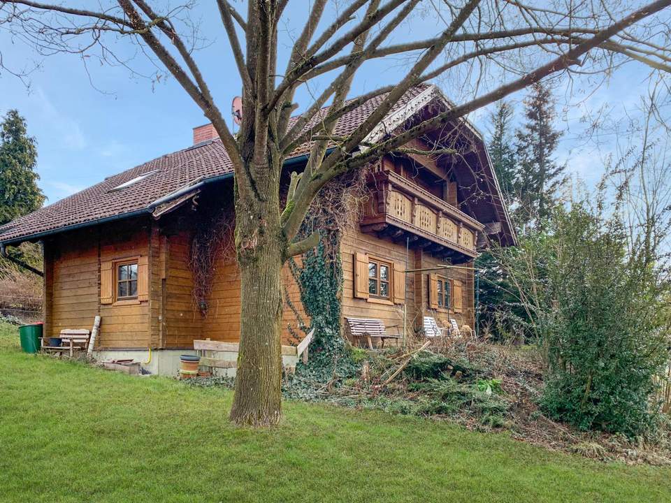 ***OPEN HOUSE Freitag, 7. März 2025 von 13 - 16 Uhr*** Charmantes Holzblockhaus in wunderschöner Naturrandlage in Bubing