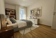 Lichtdurchfluteter Erstbezug: 3-Zimmer mit Loggia und Weitblick in top Lage!