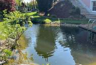 Eine Einzigartige Liegenschaft mit Schwimmteich für Wasserliebhaber