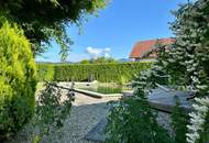 Exklusives Wohnen mit Schwimmteich & Galerie - Ihr zu Hause wartet
