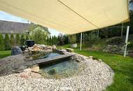 Ihr kleines Wohnparadies: Neuwertiger Bungalow mit Garten und Carport
