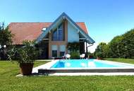WILHERING: Perfekt aufgeteiltes Wohnhaus mit XL- Garage, Pool auf einem hervorragenden Grundstück mit ca. 1.069m²