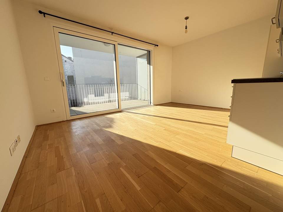 Traumhafte 1 Zimmerwohnung nahe der Donau mit wunderbarer Loggia ausgerichtet in den Innenhof