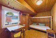 Ein ganz besonderer Platz am Bodensee – charmantes Bootshaus mit eigener Bootsgarage direkt am Wasser
