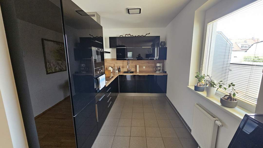 Traumhafte 4-Zimmer-Wohnung in Mannswörth mit Balkon, Terrasse & Garage – 104m² Wohnkomfort!