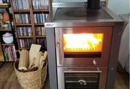 "Kaminfeuer trifft Gartentraum: Topmoderne Gartenwohnung im Wienerwald"