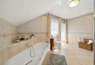 High-end living in a peaceful green location! A feel-good retreat in a class of its own: tradition meets state-of-the-art comfort!