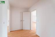 Hochwertige Erstbezugs-Wohnung mit großem Hof-Balkon und Küche nahe Schönbrunn!