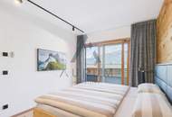 Penthouse mit Dachterrasse &amp; Whirlpool in zentraler und pistennaher Lage mit Kaiser- &amp; Hornblick