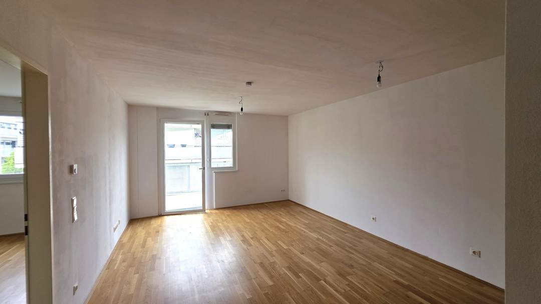 Neubauwohnung mit großem West-Balkon + Deckenkühlung / 2.OG