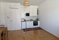 Bbefristet vermietete und klimatisierte 2-Zimmer-Wohnung mit hofeseitiger Terrasse mit opt. Garagenstellplatz!