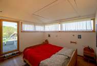 Nachhaltig wohnen mit Erdwärme – Architektenhaus in idyllischer Grünruhelage mit Weitblick