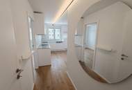 stylische 55m² Dachgeschosswohnung | 2 Zimmer | 23m² Terrasse mit Süd-West Blick | Klimaanlage & Außenjalousien