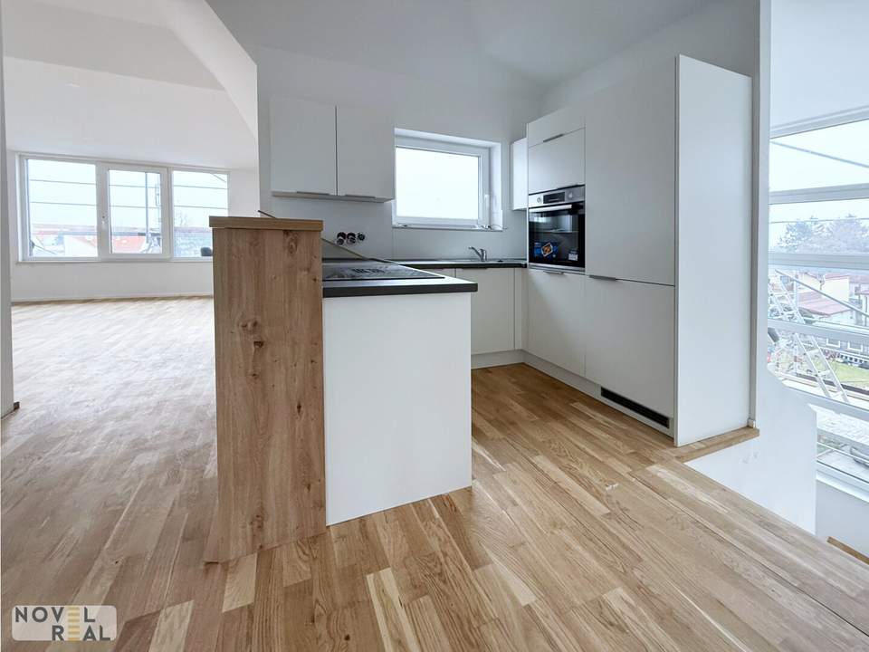 Außergewöhnliche DG-Wohnung mit 4 Terrassen und eigenem Liftzugang!